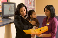 Kiddie Academy interior with children and employees