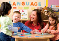 Kiddie Academy interior with children and employees