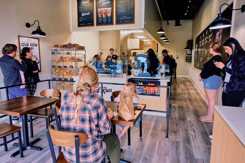 Jeff's Bagel Run franchise opportunity, interior with customers